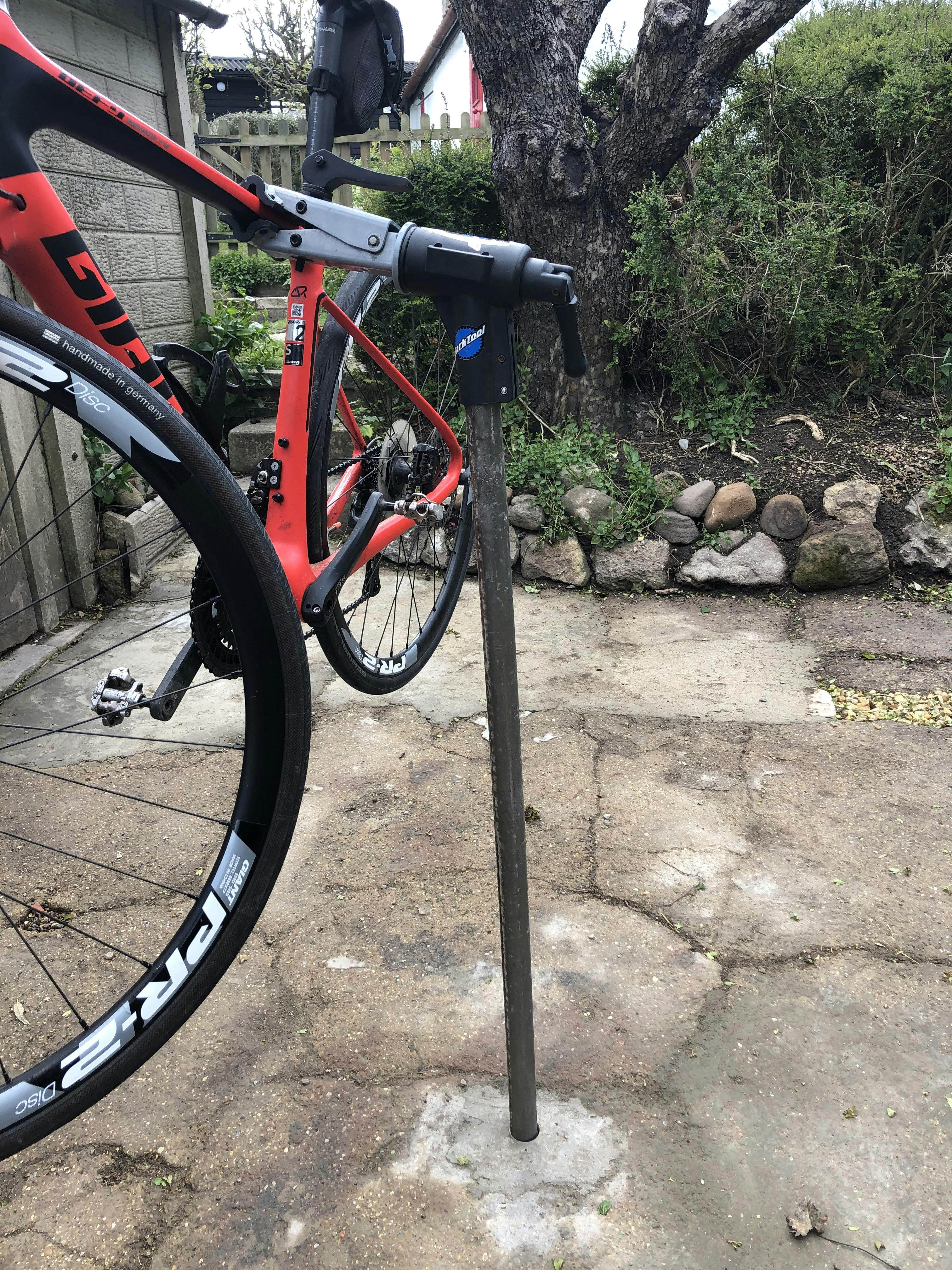 Semi fixed bike wash stand